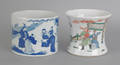 Two Asian porcelain containers with family scenes
