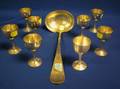 Whiting Aesthetic Sterling Silver Ladle and a Set of Eight 990 Silver Egg Cups