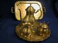 Two Silver Plated Serving Trays and a ThreePiece Coffee Set