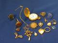 Group of Gold Pendants Brooches Charms and Assorted Rings