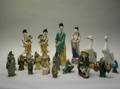 Eighteen Asian Glazed Pottery and Porcelain Figures