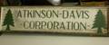 Green and White Painted Wood AtkinsonDavis Corporation Sign