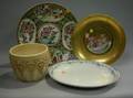 Three European and Asian Ceramic Platters and an Art Pottery Jardiniere