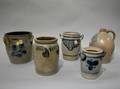 Five Cobalt Decorated Stoneware Crocks and a Jug