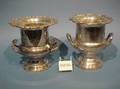 Two Silver Plated Champagne Buckets Caster Set and a Brass and Wood Wine Tilt