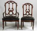 Set of Twelve American Renaissance Revival Walnut Dining Chairs