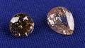 Two Unmounted Colored Diamonds