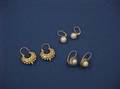 Two Pairs of Gold and Pearl Earrings and a Pair of Gold Hoops