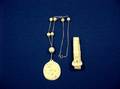 Articulated Ivory Buckle Bracelet and an Asian Necklace