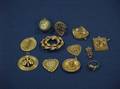 Ten Pendants Two Rings and a Brooch