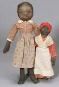 Two Oil Painted Black Cloth Dolls