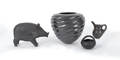 Four black on black Native American pottery pieces
