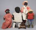 Group of Eight Black Cloth Dolls