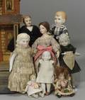 Eight Small and Doll HouseSized Dolls