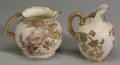 Two English Porcelain Handpainted and Parcel Gilt Pitchers