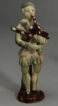 Astburytype Staffordshire Figure of a Bagpiper