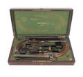 Matched cased pair of Alfred Gauvin French percussion dueling pistols