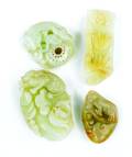 Four Chinese carved jade stones