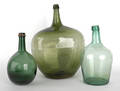 Three blown glass demijohn bottles