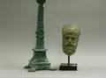 Archaic Bronze Bust and Patinated Bronze Pricket Candlestick