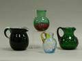 Four Victorian Colored Art Glass Pitchers