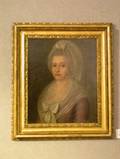 Continental School 18th19th Century Portrait of a Lady in Puce with a Lace Bonnet