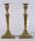 Pair of Engraved Bronze Candlesticks