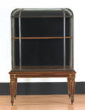 Terrarium style display cabinet with carved and gilded oak base