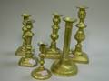 Two Pairs of Brass Candlesticks and Two Brass Chambersticks