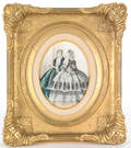 Pair of elaborate Victorian frames with Godey prints