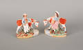 Two Staffordshire cow and figure groups