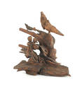 Carved driftwood of birds and a human figure