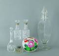Three cut glass decanters