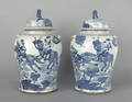 Pair of Chinese export blue and white baluster form urns and covers 19th c