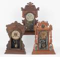 Three Victorian gingerbread clocks