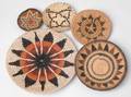 Five Southwestern woven trays and bowls