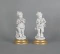 Pair of French bisque figures of children