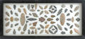 Framed collection of arrowheads