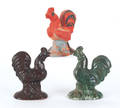 Three RR Stahl redware roosters