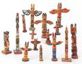 Fifteen carved Native American totem poles
