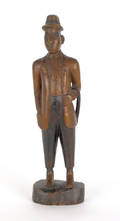 Carved figure of a gentleman early 20th c