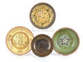 Four Stahl pottery redware plates dated between 19401951