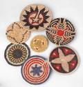 Seven Contemporary Native American tray baskets