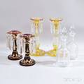 Two Pairs of Cranberry and Amber Glass Girandoles and a Pair of Colorless Glass Decanters