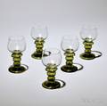 Five Hunt Goblets the colorless glass globes each with a scene of the hunt on substantial olive glass stems with rosettes ht 6 in