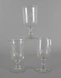 Three etched colorless glass celery vases