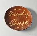 Redware Plate with Yellow Slip Inscription Bread  Cheese