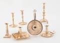 Seven brass candlesticks