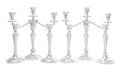 A Set of Four American Silver Candlesticks and a Pair of Candelabra