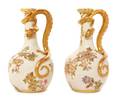 A Pair of Royal Worcester Porcelain Ewers